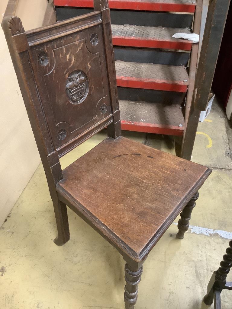 A Victorian Aesthetic movement carved oak hall seat, another carved oak chair, a tile top occasional table and a rectangular occasional table